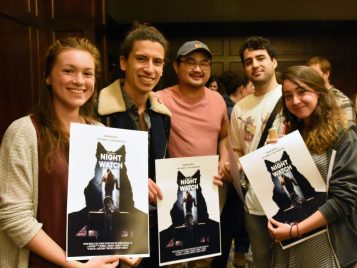 Andrew Day's supporters show off their NIGHT WATCH posters at the reception before the screening of the film.